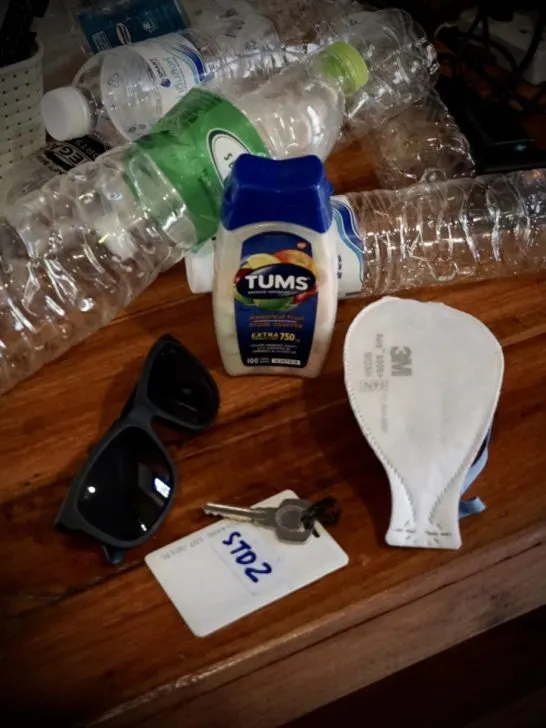 A funny depiction of life in Southeast Asia (bottled water, tums, and a mask)