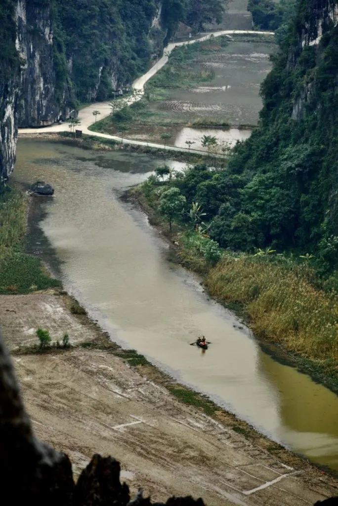 View of a boat tour in the Ngo Dong River from the Mua Cave Viewpoint