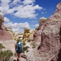 Emily hiking through the colorful sandstone-capped spires in the Paint Mines.