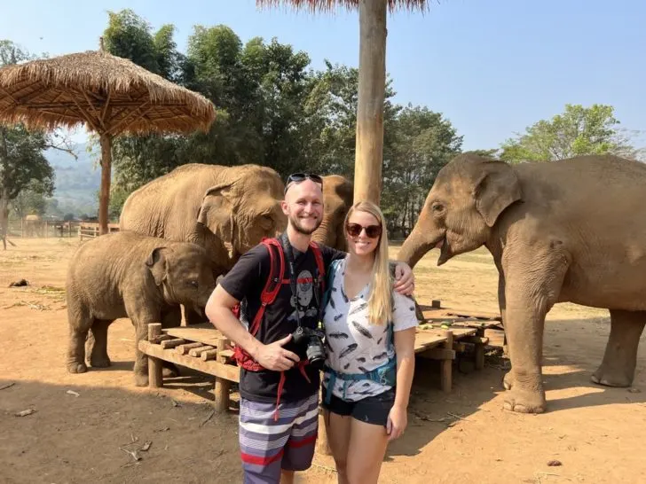 Us Posing in front of the Elephants at the Elephant Nature Park
