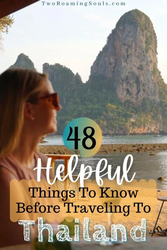 a girl looking in the distance with a limestone pillar at Tonsai Beach with words overlay "48 Helpful Things To Know Before Traveling To Thailand"