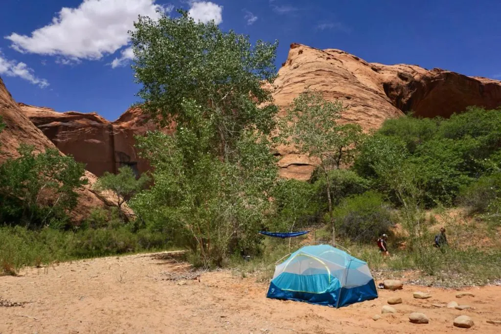 Tent and hammock Camping in desert red rocks