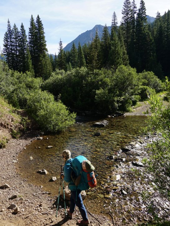 Emily getting to the First river crossing for Copper Lake Trail