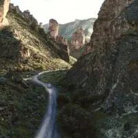 Our campervan driving the winding canyon road through Leslie Gulch.