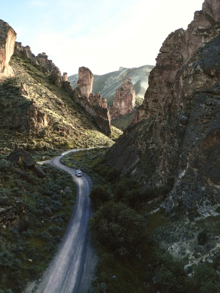 Our campervan driving the winding canyon road through Leslie Gulch.