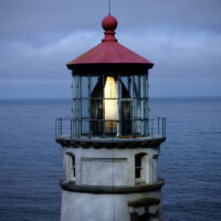 A close-up moody photo of Heceta Head Lighthouse.