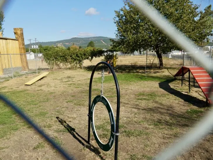 an artsy shot of the fenced in dog park at the Spokane KOA Journey