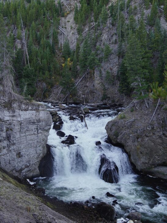 a view of Firehole Falls from the canyon wall