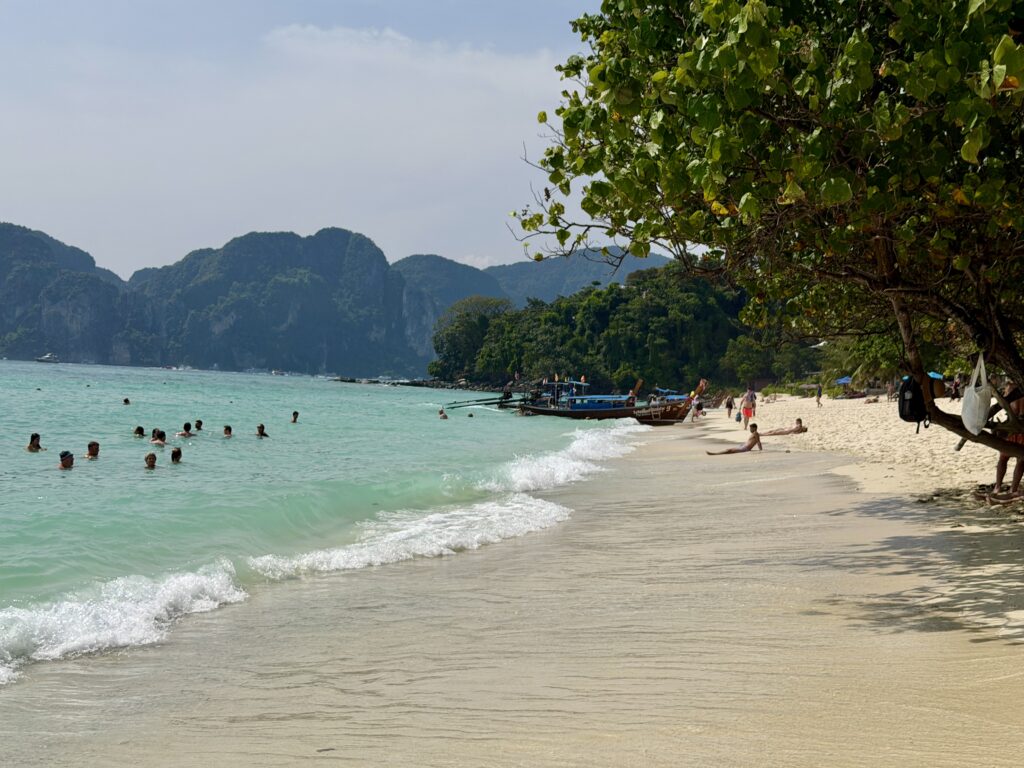 people swimming at long beach in phi phi don