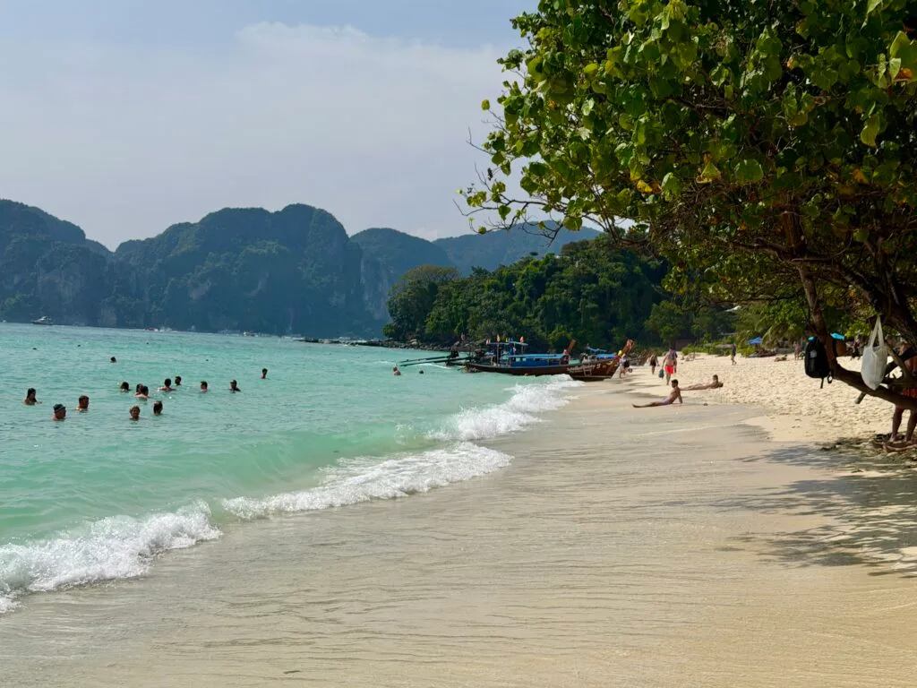 people swimming at long beach in phi phi don