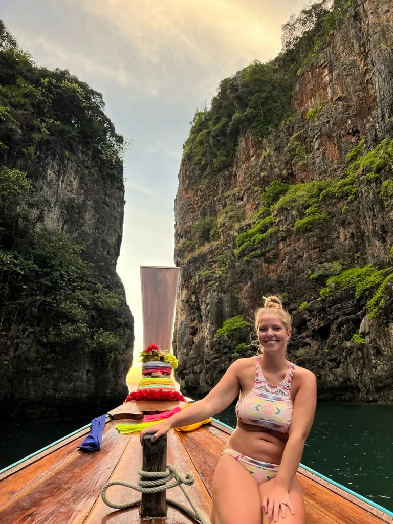 Emily posing on a private long tail boat cruise in Wang Long Bay in the phi phi islands
