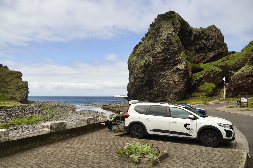 Em enjoying the view in the Porto Moniz Campground Parking Lot